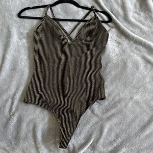 Black and gold bodysuit